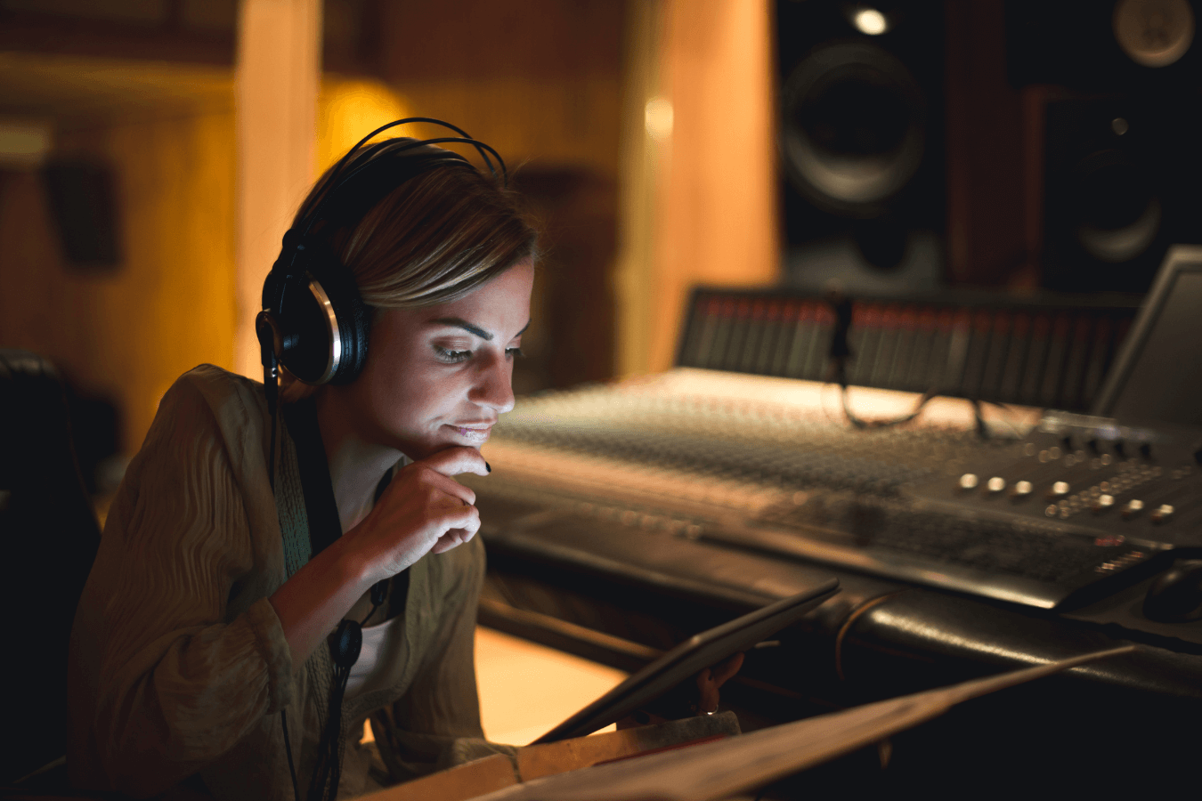 singer songwriter music producer writing a song playing a song